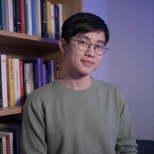 Jordan, a 34-year-old autistic software engineer in a cozy home setting